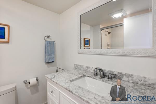 Bathroom photo of waterfront Breakers Condo for sale in Naples, FL