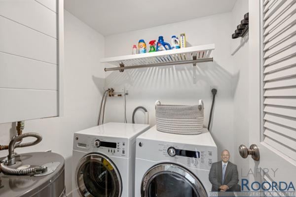 Laundry area of waterfront Breakers Condo for sale in Naples, FL