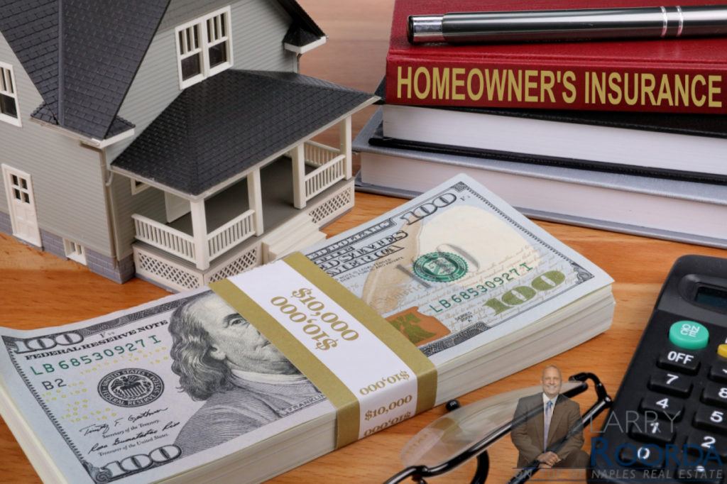 How to lower your homeowners insurance premium for free with five tips. Illustration of cash on a table nextr to a model of a house and books that read "homeowners insurance."