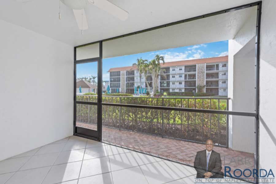 Sunny lanai offers garden views at Bordeaux Club #105 at 900 Gulf Shore Bvd.