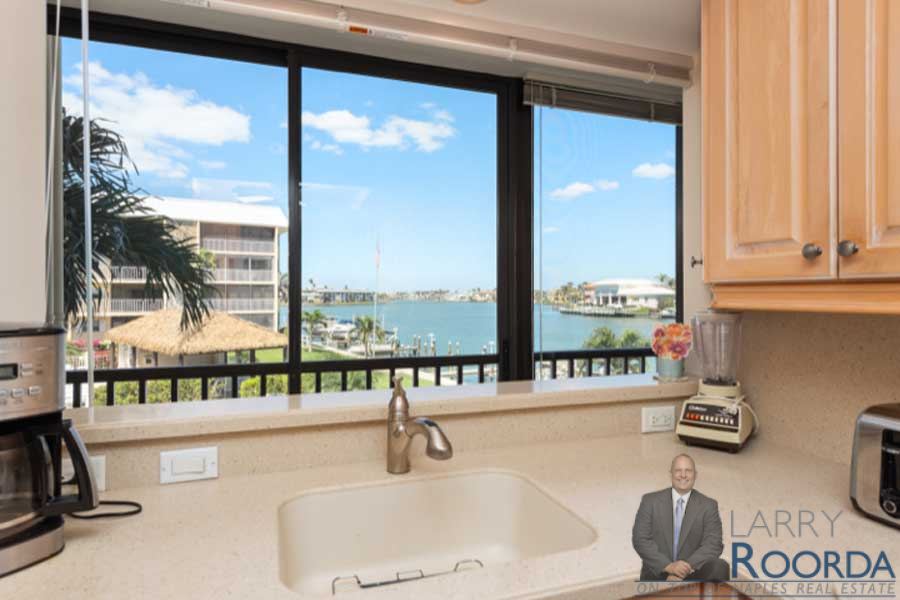 Water views from the kitchen at Harbour Cove #216 The Moorings, Naples, FL. Larry Roorda Realtor.