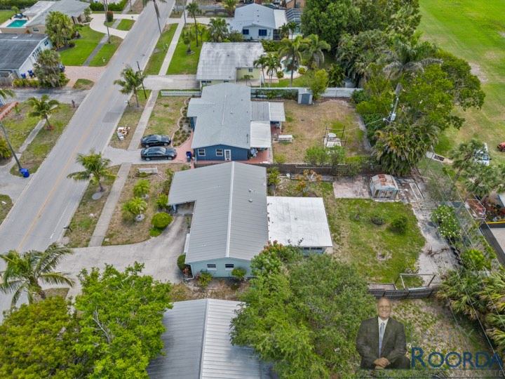 Side aerial view. 1030 22nd Ave N, Naples.